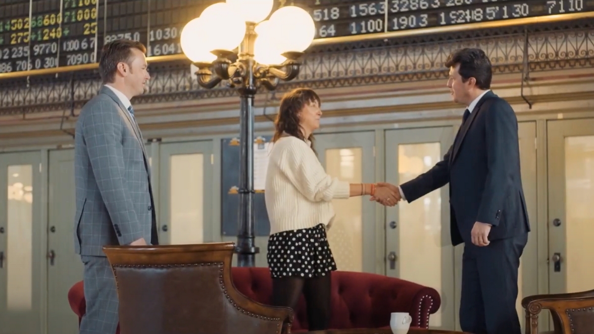 Bill and Rick Sand meeting an old lady for a case discussion, Rick is shaking hand with the lady