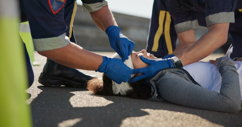 woman with injured neck after car accident - common types of personal injuries - sand law llc